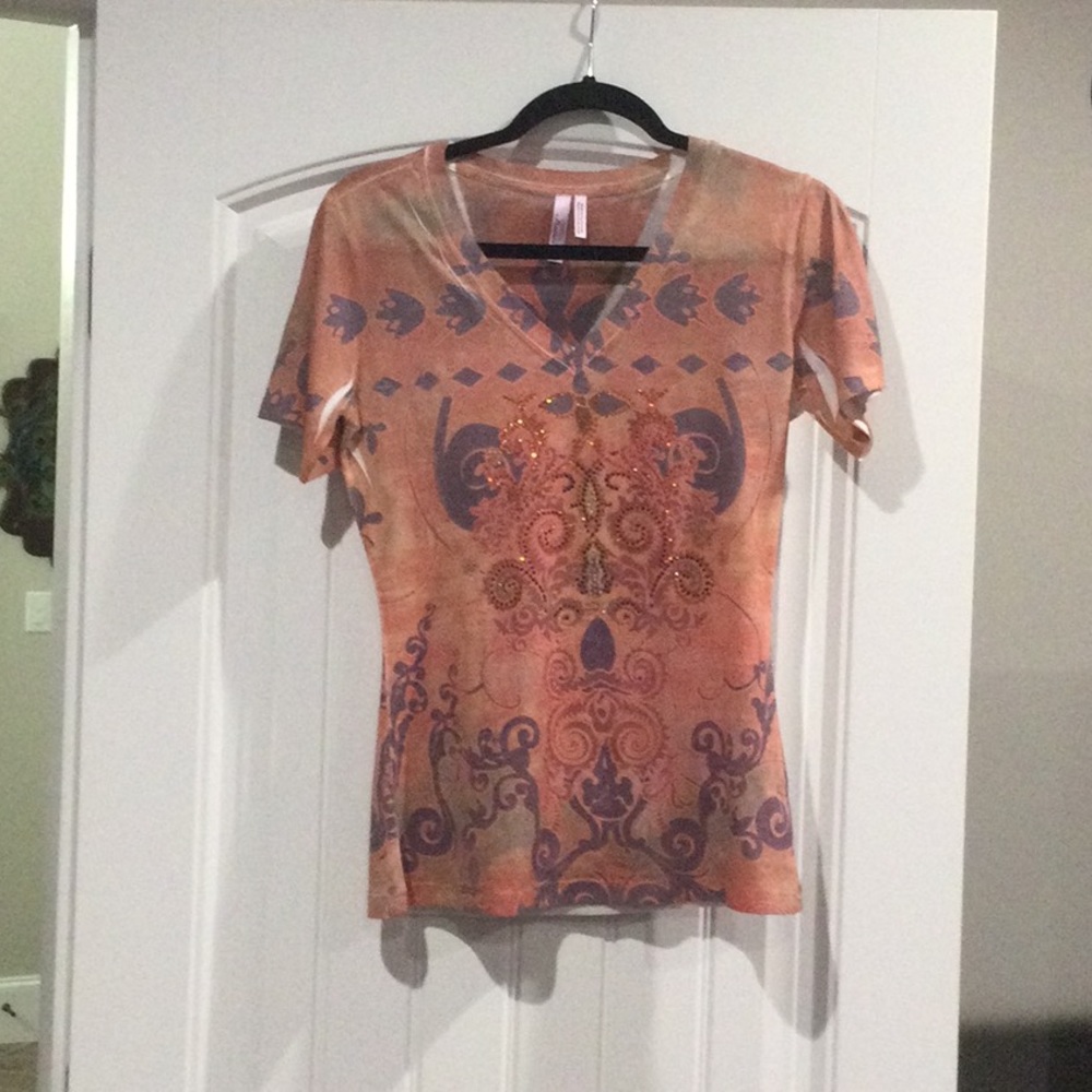 Kiara brand embellished T-shirts.